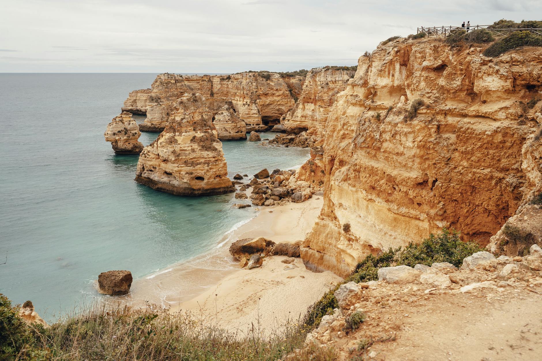 Experience the breathtaking coastal cliffs and turquoise waters - a natural masterpiece captured in serene perfection.